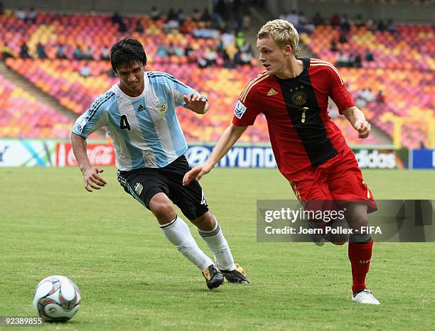 Leandro Marin of Argentina and Christopher Buchtmann of Germany battle for the ball during the FIFA U17 World Cup Group A match between Argentina and...