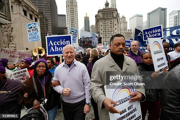 Andy Stern President of the Service Employees International Union and Jesse Jackson , President and founder of the Rainbow PUSH Coalition, lead a...