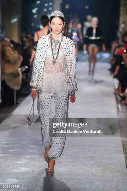 Model walks the runway at the Dolce & Gabbana show during Milan Fashion Week Fall/Winter 2018/19 on February 24, 2018 in Milan, Italy.