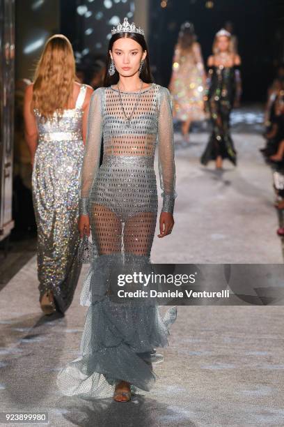 Model walks the runway at the Dolce & Gabbana show during Milan Fashion Week Fall/Winter 2018/19 on February 24, 2018 in Milan, Italy.