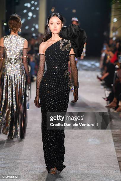 Model walks the runway at the Dolce & Gabbana show during Milan Fashion Week Fall/Winter 2018/19 on February 24, 2018 in Milan, Italy.