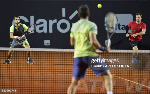 Austria's Alexander Peya and Croatia's Nikola Mektic play during their ATP World Tour Rio Open final doubles tennis match against Spain's Fernando...