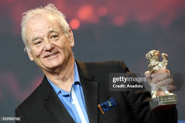 Actor Bill Murray addresses a news conference after received a Silver Bear on behalf of Wes Anderson for the best director during the 68th edition of...