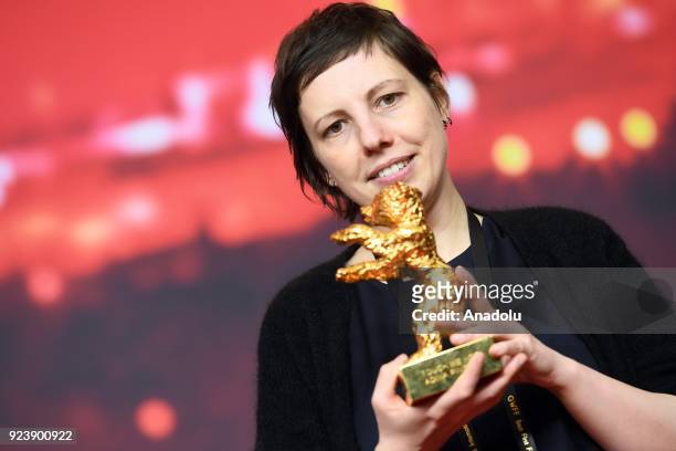 Director and screenwriter Adina Pintilie holds the golden bear for the best movie for her film 'Touch me not' at a news conference during the 68th...