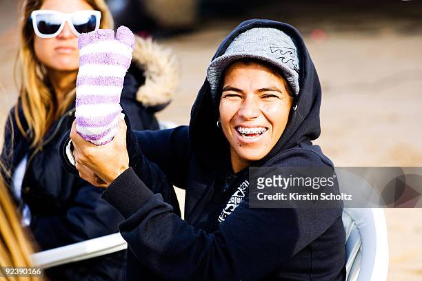 Silvana Lima of Brazil shows off her winter toe warmers during a lay day at the Rip Curl Pro Search on October 27, 2009 in Peniche, Portugal.
