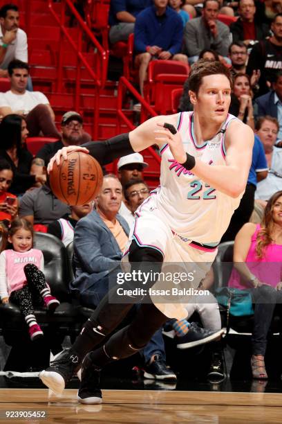 Luke Babbitt of the Miami Heat handles the ball during the game against the Memphis Grizzlies on February 24, 2018 at American Airlines Arena in...