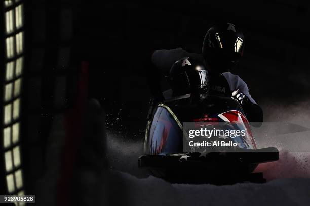 Justin Olsen, Nathan Weber, Carlo Valdes and Christopher Fogt of the United States finish their run during the 4-man Boblseigh Heats on day sixteen...