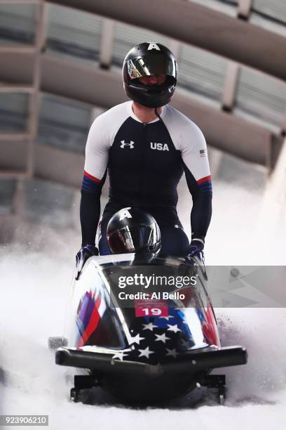 Justin Olsen, Nathan Weber, Carlo Valdes and Christopher Fogt of the United States finish their run during the 4-man Boblseigh Heats on day sixteen...