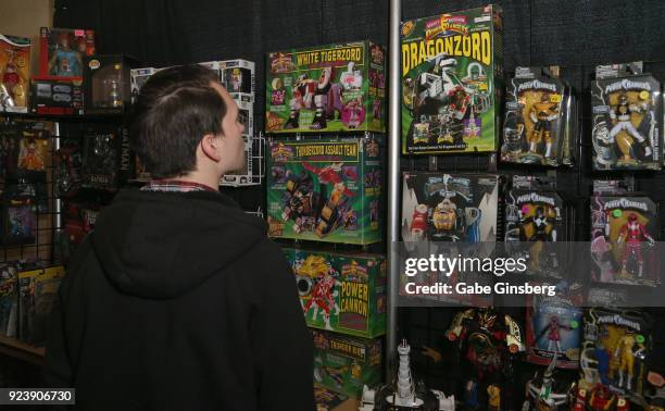 An attendee looks at toys from the "Power Rangers" television franchise during Vegas Toy Con at the Circus Circus Las Vegas on February 24, 2018 in...