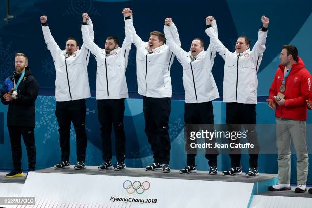 Gold medalists Joe Polo, John Landsteiner, Matt Hamilton, Tyler George and John Shuster of USA during ceremony following the Men's curling Final game...