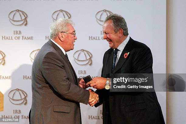 Dr.Syd Millar of Ireland and the Lions receives his award from Bill Beaumont after being inducted into the IRB Hall of Fame during the induction...