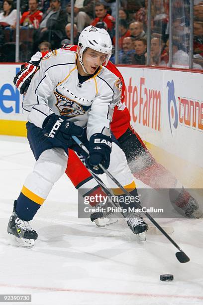 Alexander Sulzer of the Nashville Predators handles the puck against the Ottawa Senators during a game at Scotiabank Place on October 22, 2009 in...