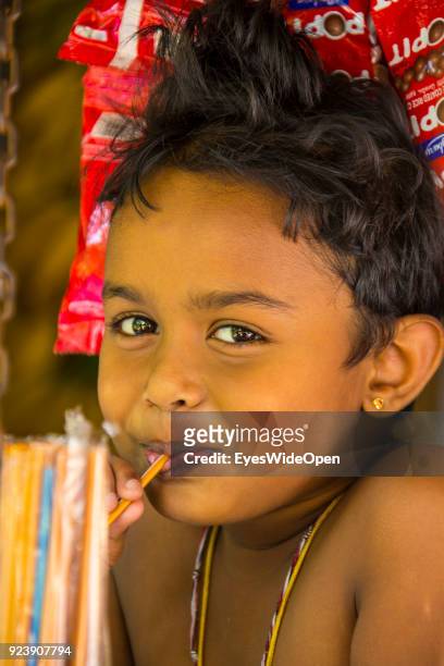 Portrait of a local child girl on February 22, 2014 in Pinnawela, Sri Lanka.