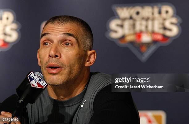 Manager Joe Girardi of the New York Yankees talks at a press conference after World Series workouts on October 27, 2009 at Yankee Stadium in the...