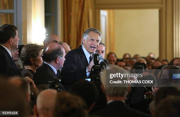 French former Prime Minister Dominique de Villepin addresses his sympathisers on October 27, 2009 in Paris, upon his arrival at La maison d'Amerique...