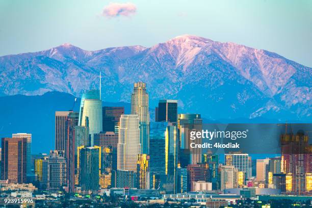 los angeles in the evening hour - us bank tower stock pictures, royalty-free photos & images