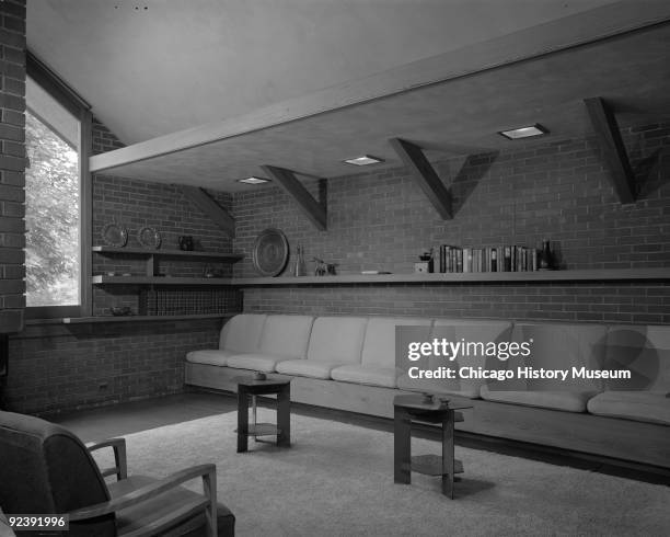 Interior, study with seating along the wall of the Carroll Alsop residence at 1907 A Avenue East in Oskaloosa , designed by Frank Lloyd Wright, July...