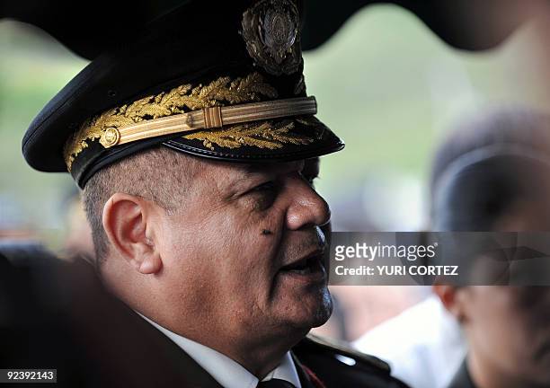 The Chief of the Honduran Armed Forces, General Romeo Vasquez Velasquez speaks on October 27 in Tegucigalpa, during the funeral of Colonel Concepcion...
