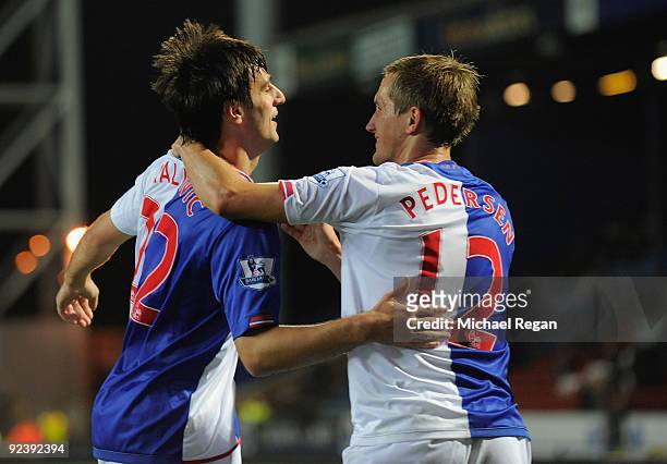 Nikola Kalinic of Blackburn celebrates scoring a penalty with Morten Gamst Pedersen to make it 5-2 during the Carling Cup 4th Round match between...