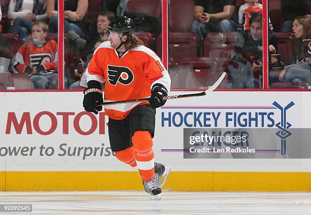 Scott Hartnell of the Philadelphia Flyers skates past the Hockey Fights Cancer dasher in a NHL game against the Florida Panthers on October 24, 2009...