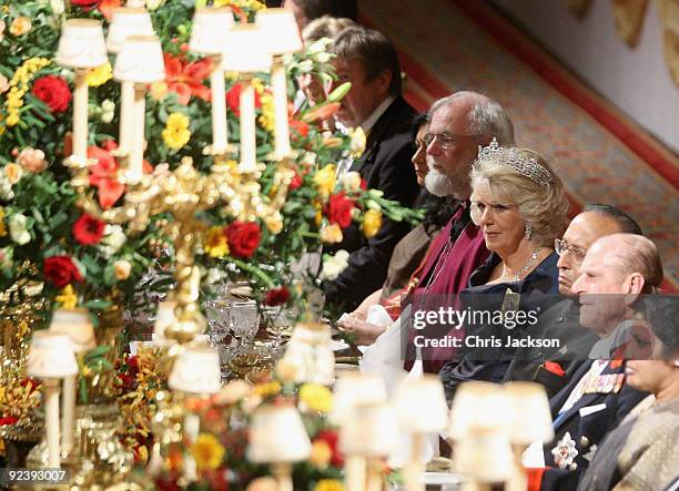Camilla, Duchess of Cornwall, Dr Rowan Williams, Dr Devisingh Ramsingh Shekhawat and HRH Prince Philip, Duke of Edinburgh sit during a State Banquet...