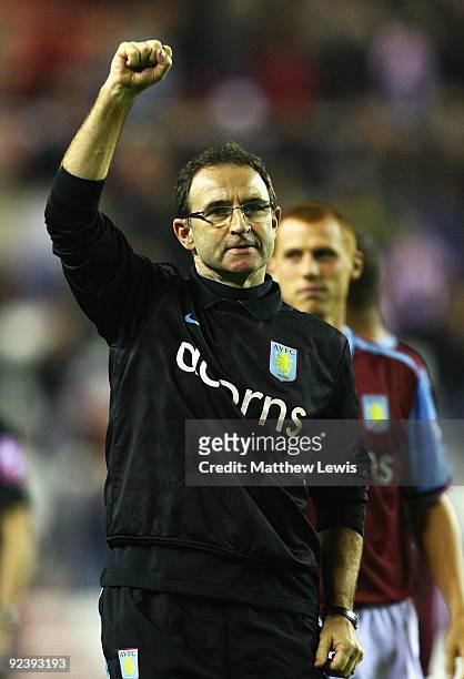 Martin O'Neill, manager of Aston Villa celebrates his teams win during the Carling Cup 4th Round match between Sunderland and Aston Villa at the...