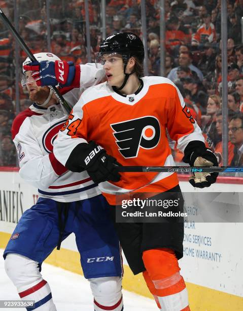 Making his NHL debut, Oskar Lindblom of the Philadelphia Flyers skates against Karl Alzner of the Montreal Canadiens on February 20, 2018 at the...