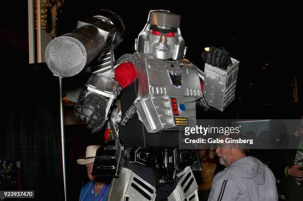 Cosplay model Mega Mike dressed as the character Megatron from the "Transformers" cartoon franchise attends Vegas Toy Con at the Circus Circus Las...