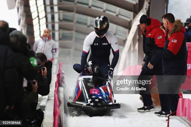 Justin Olsen, Nathan Weber, Carlo Valdes and Christopher Fogt of the United States finish their final run during the 4-man Boblseigh Heats on day...