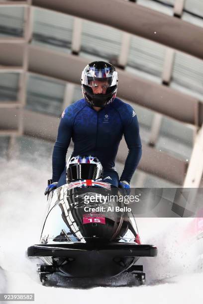 Lamin Deen, Ben Simons, Toby Olubi and Andrew Matthews of Great Britain finish their final run during the 4-man Boblseigh Heats on day sixteen of the...