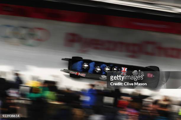 Lamin Deen, Ben Simons, Toby Olubi and Andrew Matthews of Great Britain make a final run during the 4-man Boblseigh Heats on day sixteen of the...