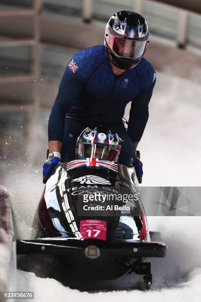 Brad Hall, Nick Gleeson, Joel Fearon and Greg Cackett of Great Britain finish their final run during the 4-man Boblseigh Heats on day sixteen of the...