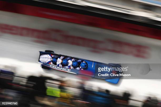 Loic Costerg, Vincent Ricard, Vincent Castell and Dorian Hauterville of France make a final run during the 4-man Boblseigh Heats on day sixteen of...
