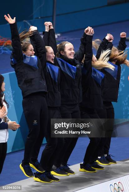 Winners of the gold medal, Jennie Waahlin, Sofia Mabergs, Agnes Knochenhauer, Sara McManus and Anna Hasselborg of Sweden celebrate following the...