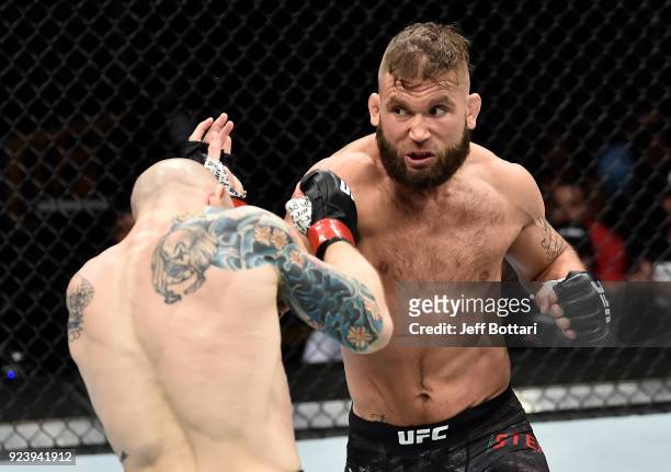 Jeremy Stephens punches Josh Emmett in their featherweight bout during the UFC Fight Night event at Amway Center on February 24, 2018 in Orlando,...