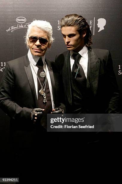 Designer Karl Lagerfeld and model Baptiste Giabiconi attend the 'We Love Hair - 111 Years Schwarzkopf' celebration at NRW Forum on October 27, 2009...
