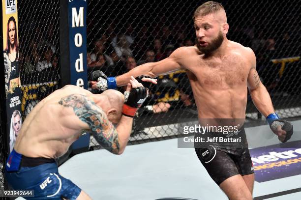 Jeremy Stephens throws a spinning back fist against Josh Emmett in their featherweight bout during the UFC Fight Night event at Amway Center on...