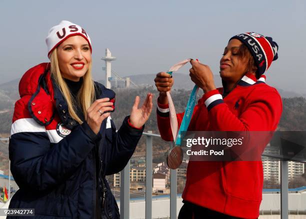 Bobsledder Lauren Gibbs of the United States shows her silver medal to Ivanka Trump on day sixteen of the PyeongChang 2018 Winter Olympic Games on...