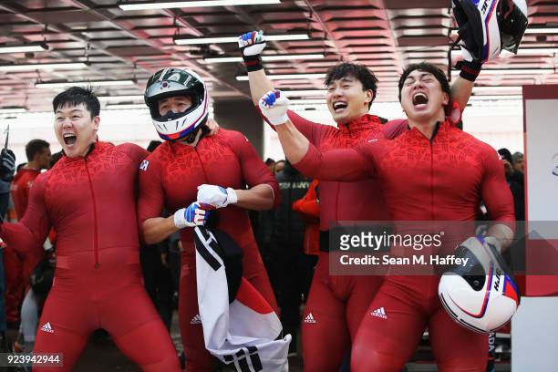Yunjong Won, Junglin Jun, Seo Youngwoo and Donghyun Kim of Korea celebrate after they finish their final run during the 4-man Boblseigh heats on day...
