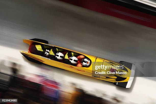 Nico Walther, Kevin Kuske, Alexander Roediger and Eric Franke of Germany compete in their final run during the 4-man Boblseigh Heats on day sixteen...