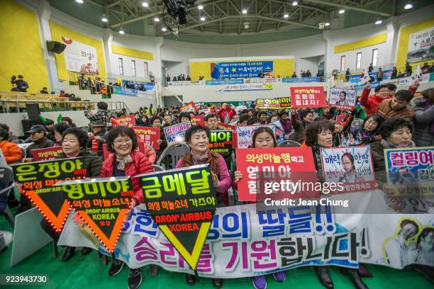 Residents cheer for the South Korean curling team at Uiseong Gymnasium on February 25, 2018 in Uiseong-gun, South Korea. The South Korean women's...