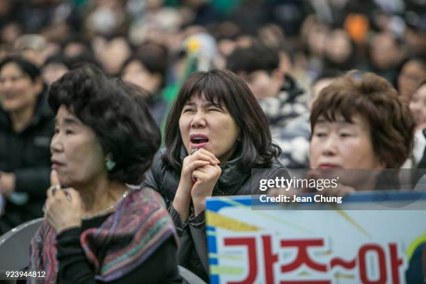 Fans express frustration as the South Korean women's curling team as the team was losing at Uiseong Gymnasium on February 25, 2018 in Uiseong-gun,...