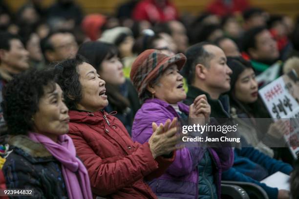 Fans express frustration as the South Korean women's curling team as the team was losing at Uiseong Gymnasium on February 25, 2018 in Uiseong-gun,...