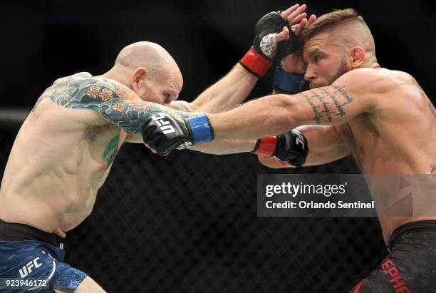 Josh Emmett, left, and Jeremy Stephens fight during UFC Fight Night at the Amway Center in Orlando, Fla., on Saturday, Feb 24, 2018.