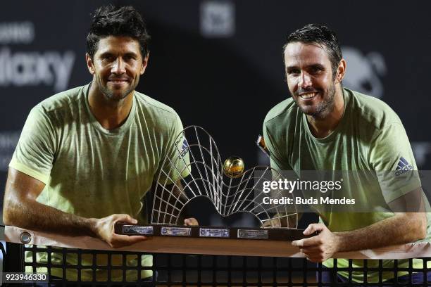 David Marrero and Fernando Verdasco of Spain raise their trophy after defeating to Alexander Peya of Austria and Nikola Mektic of Croatia during the...