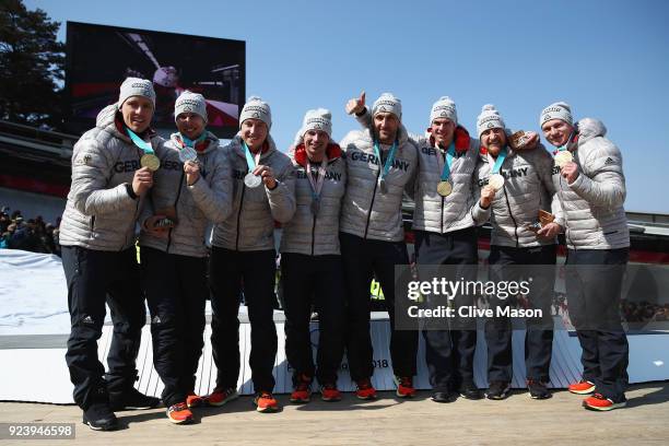 Gold medalists Francesco Friedrich, Candy Bauer, Martin Grothkopp and Thorsten Margis of Germany and joint silver medalists Nico Walther, Kevin...