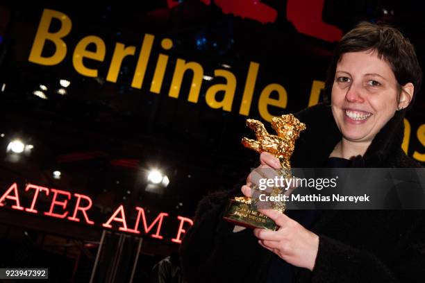 Adina Pintilie, winner of the Golden Bear for Best Film for 'Touch Me Not' poses after the closing ceremony during the 68th Berlinale International...