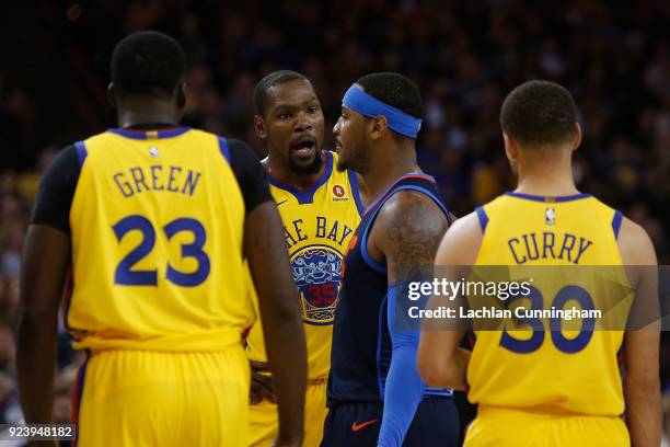 Kevin Durant of the Golden State Warriors has words with Carmelo Anthony of the Oklahoma City Thunder at ORACLE Arena on February 24, 2018 in...