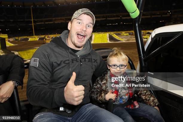 Actor Chris Pratt and son Jack attend Monster Jam Celebrity Event at Angel Stadium on February 24, 2018 in Anaheim, California.