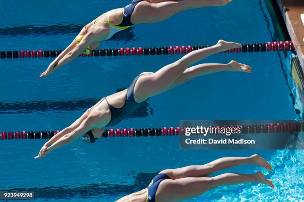 Katie Ledecky of the Stanford Cardinal dives at the start of the 500 yard Freestyle event of an NCAA PAC-12 Women's swim meet against the California...